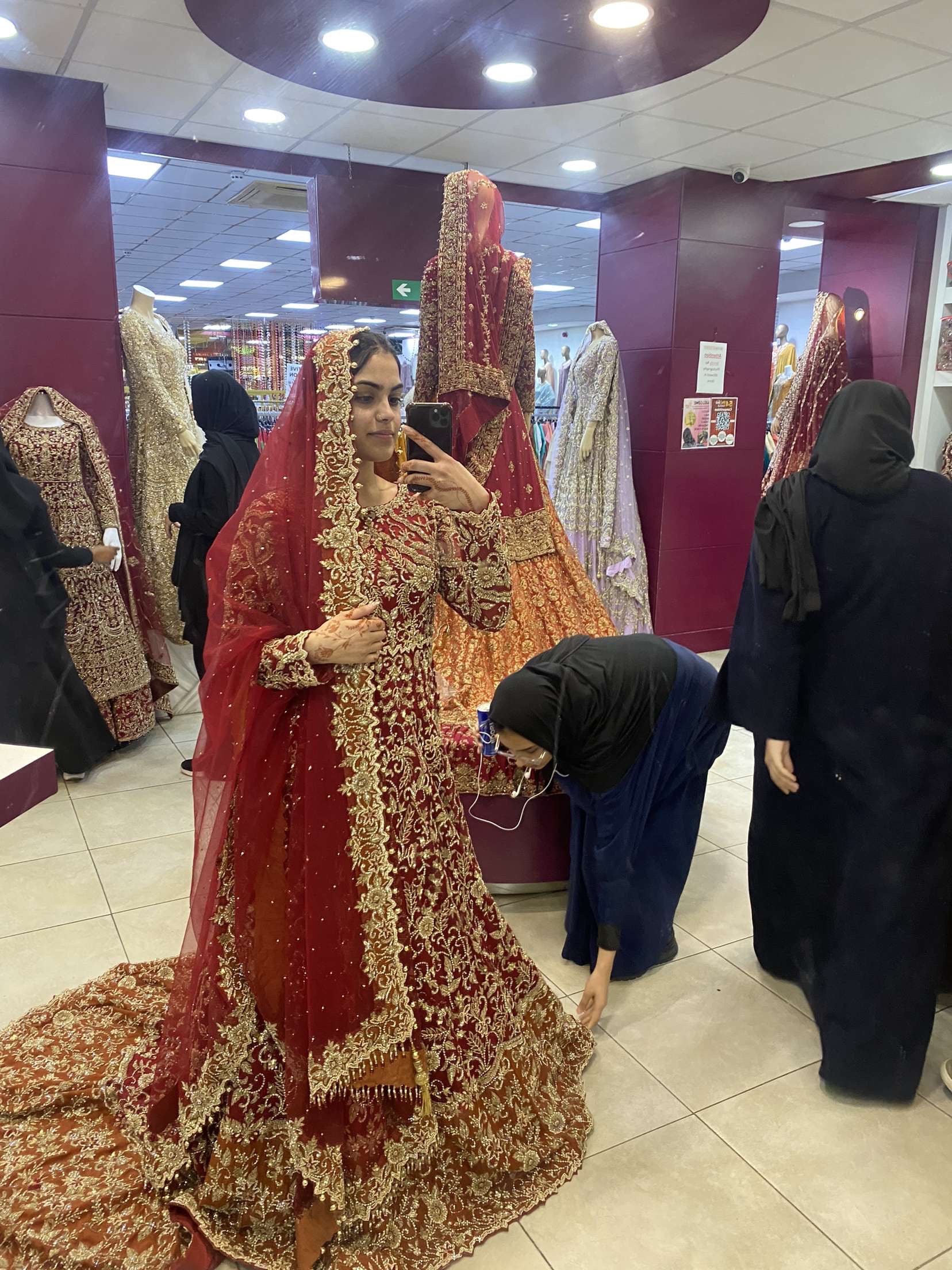 Red and orange bridal dress with gold detailing