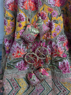 Sage green and pink lengha with very heavy embellished dupatta