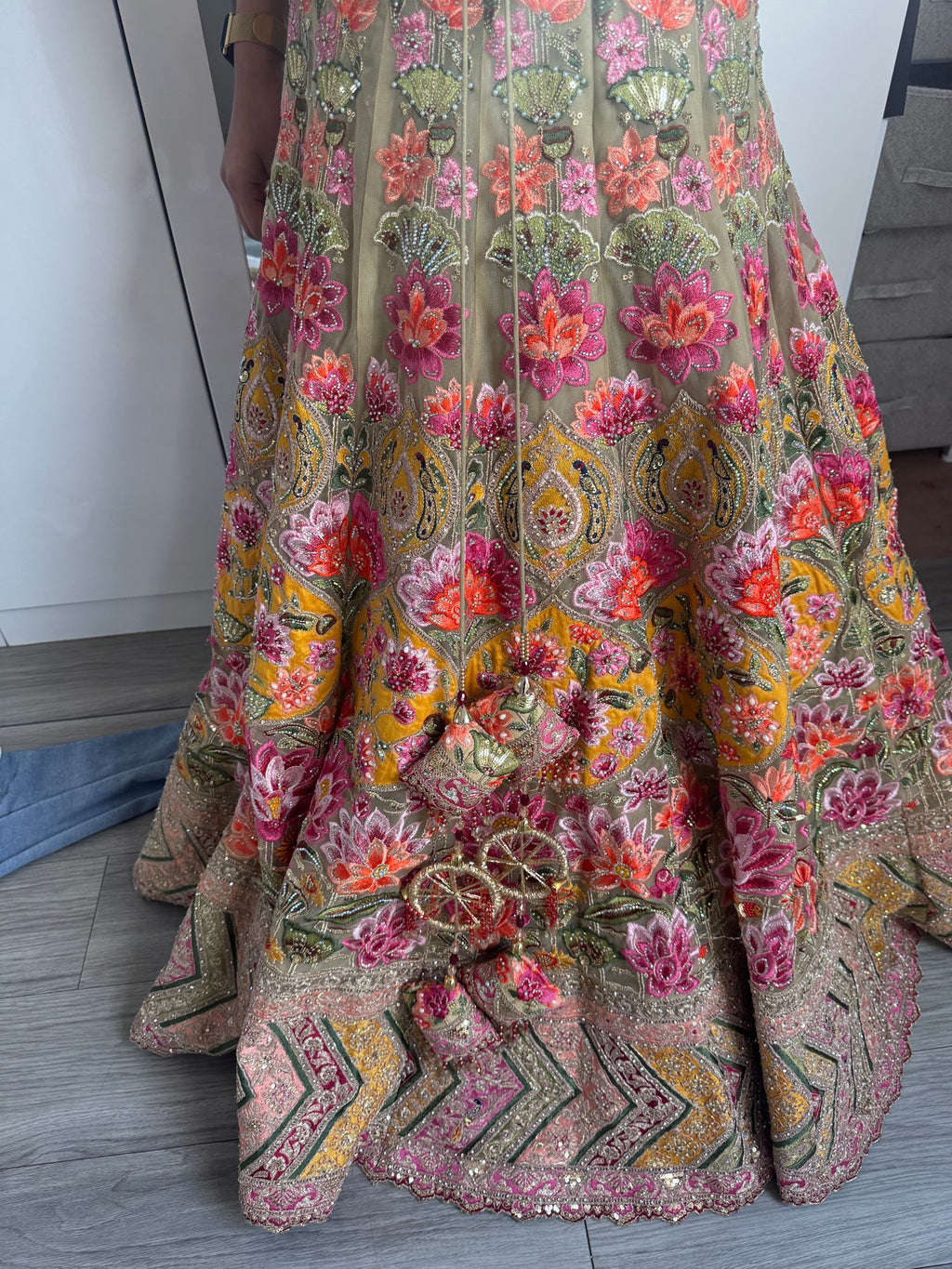 Sage green and pink lengha with very heavy embellished dupatta