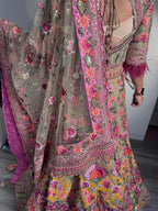 Sage green and pink lengha with very heavy embellished dupatta