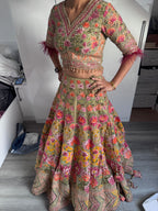 Sage green and pink lengha with very heavy embellished dupatta