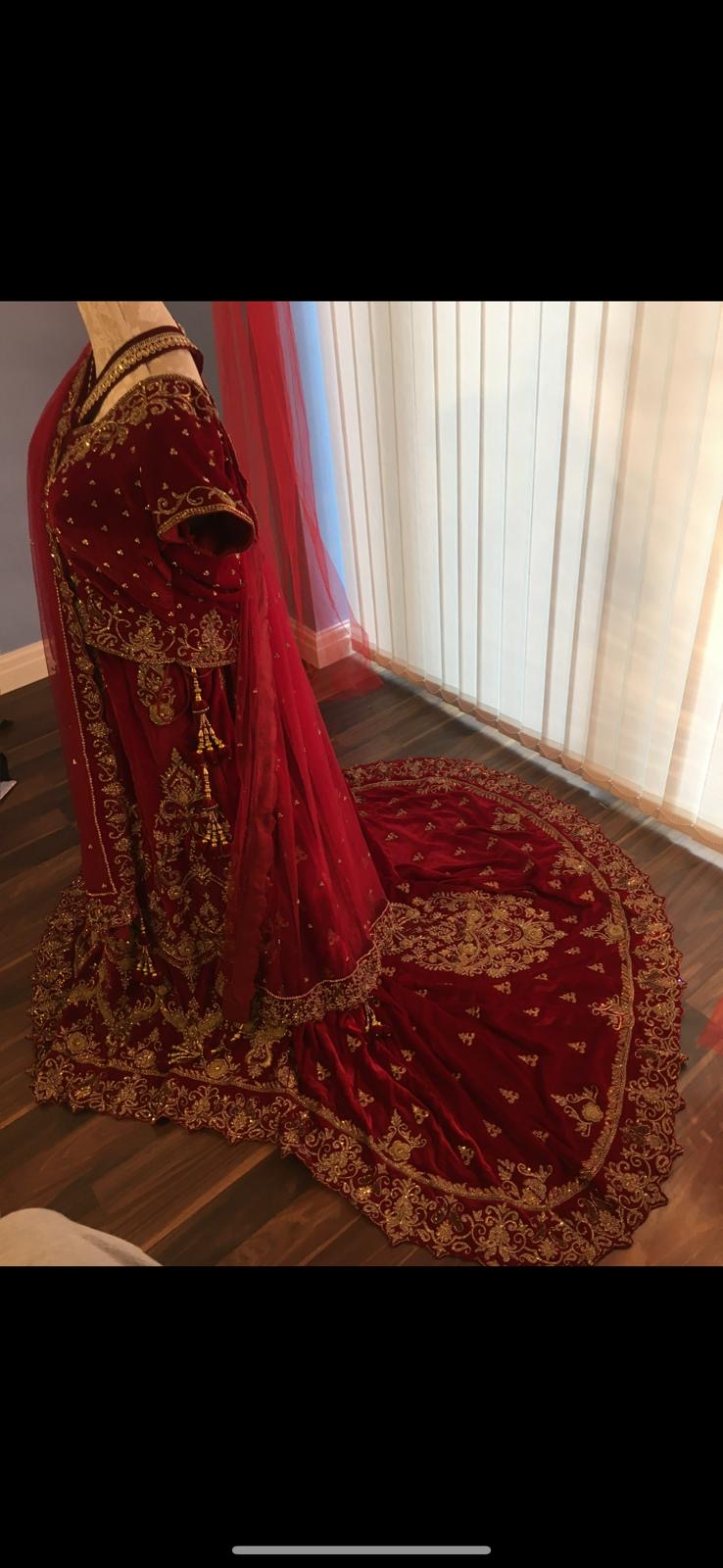 Red and gold bridal trail lengha