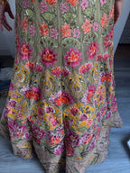 Sage green and pink lengha with very heavy embellished dupatta