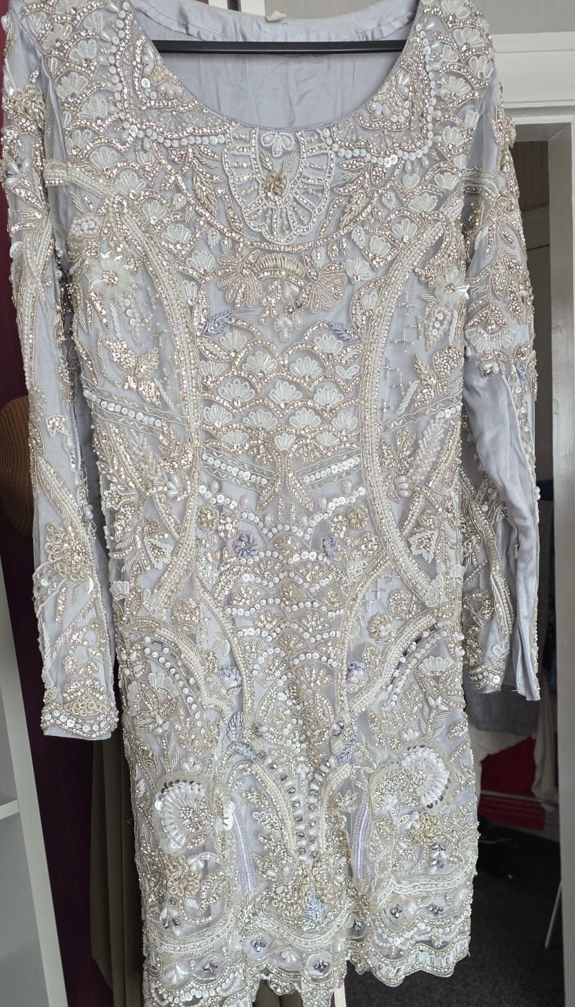 Sky blue heavy party suit by 7aatrang