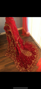 Red and gold bridal trail lengha