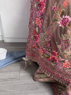 Sage green and pink lengha with very heavy embellished dupatta