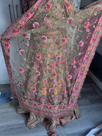 Sage green and pink lengha with very heavy embellished dupatta
