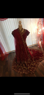 Red and gold bridal trail lengha