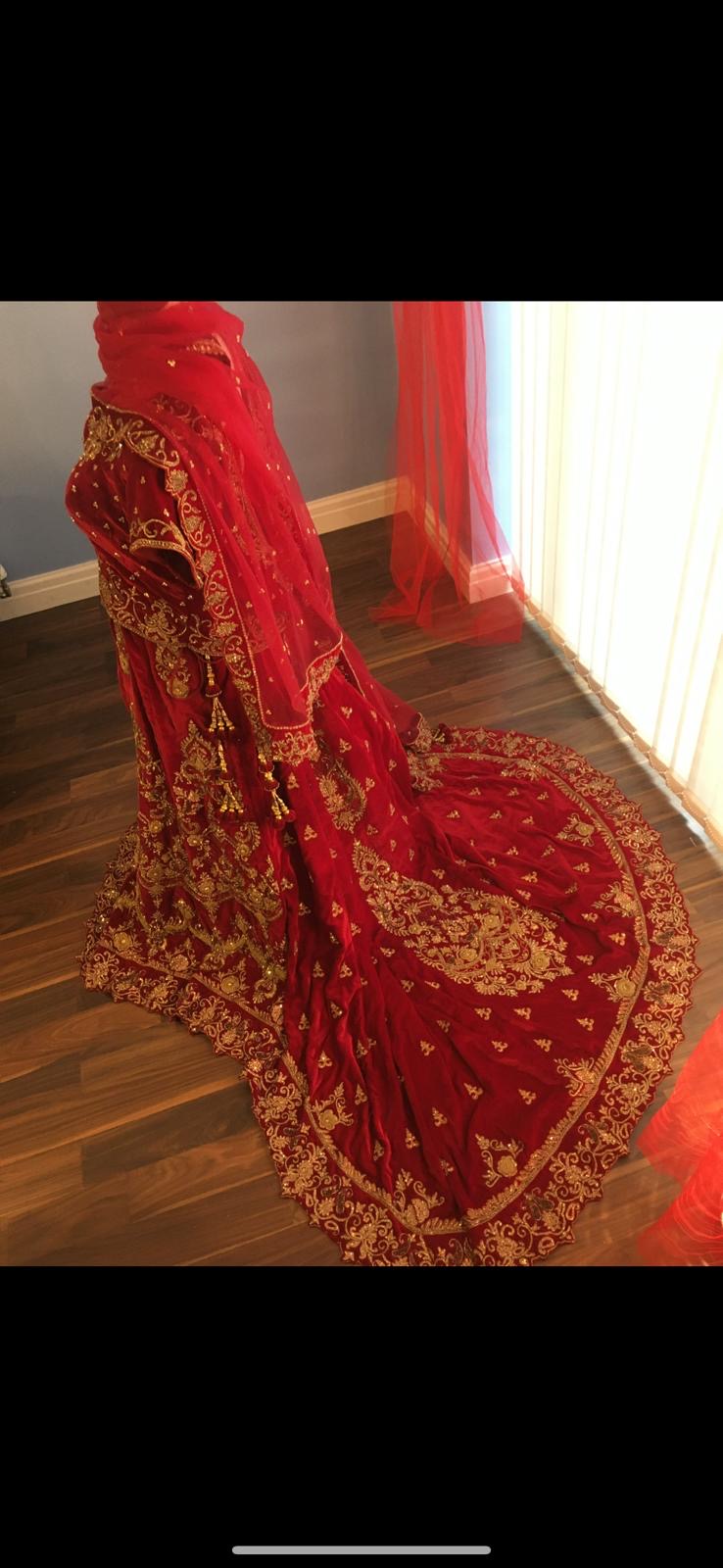 Red and gold bridal trail lengha