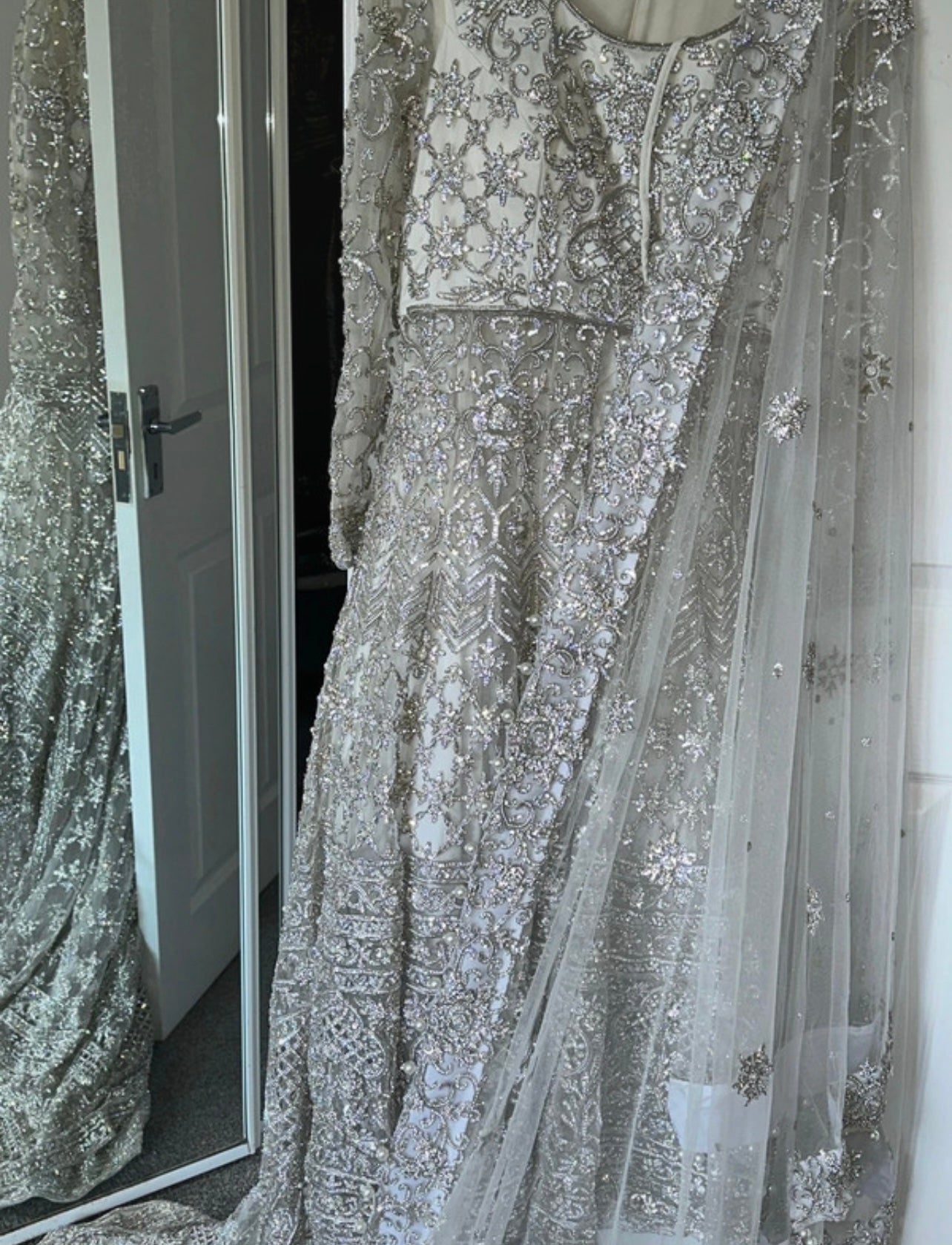 White heavy embellished lengha