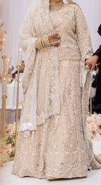 Heavily embellished bridal lengha by 7aatrang