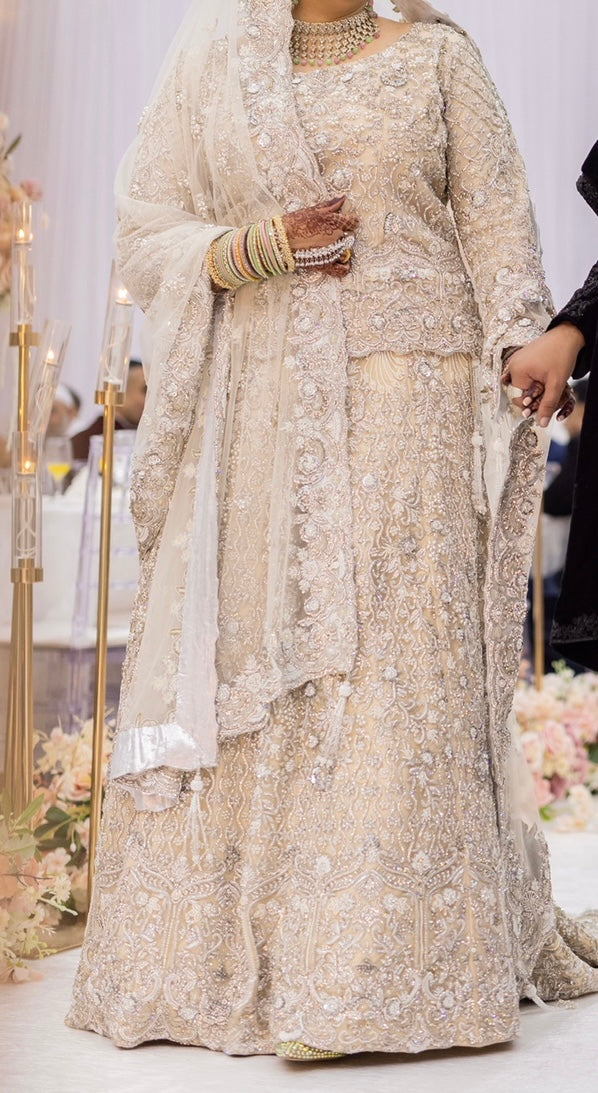 Heavily embellished bridal lengha by 7aatrang