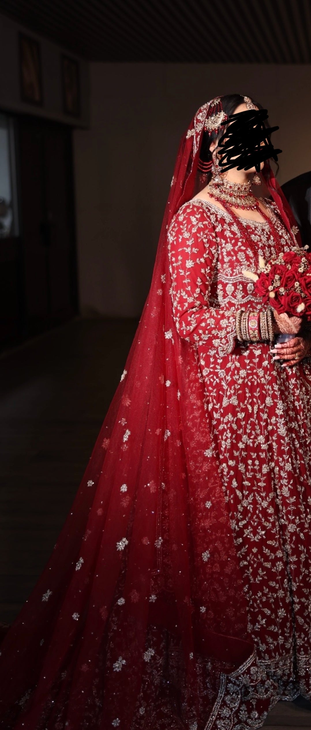 Heavy fully embroidered red Lengha with long veil