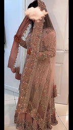 Pink lengha with heavy embroidery