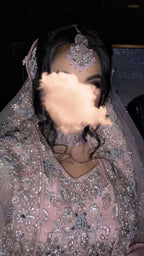 Pink lengha with heavy embroidery